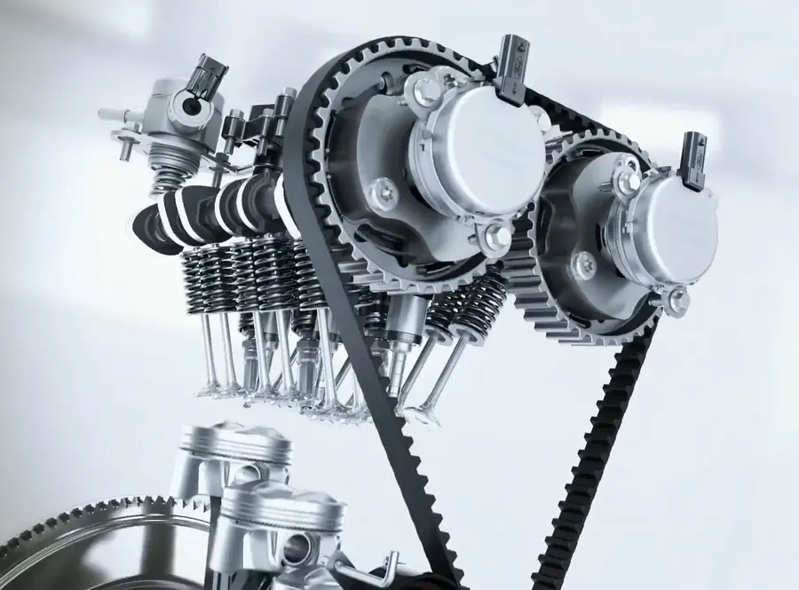 An engine’s camshafts and timing belt drive